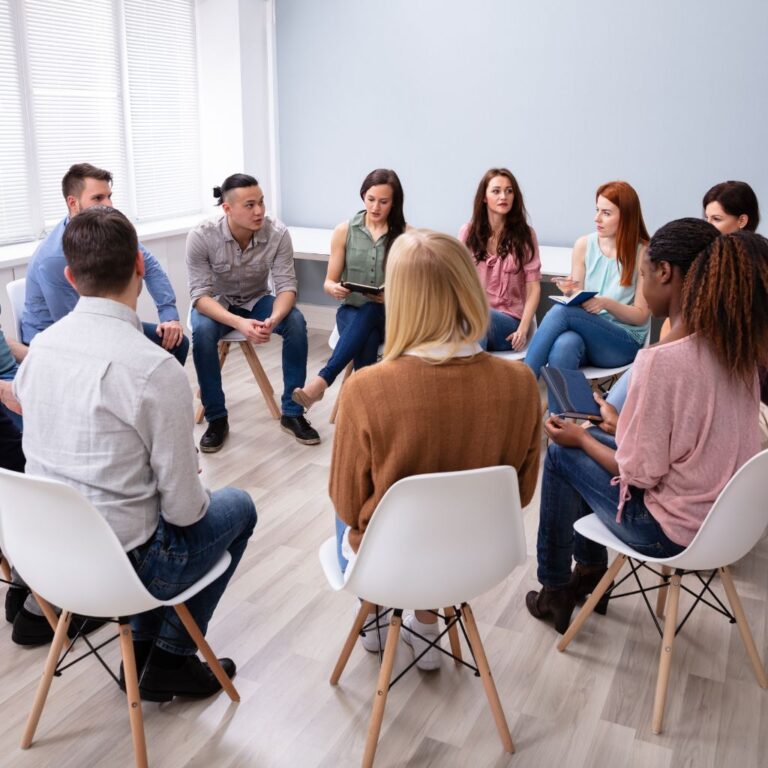 people meeting for group therapy